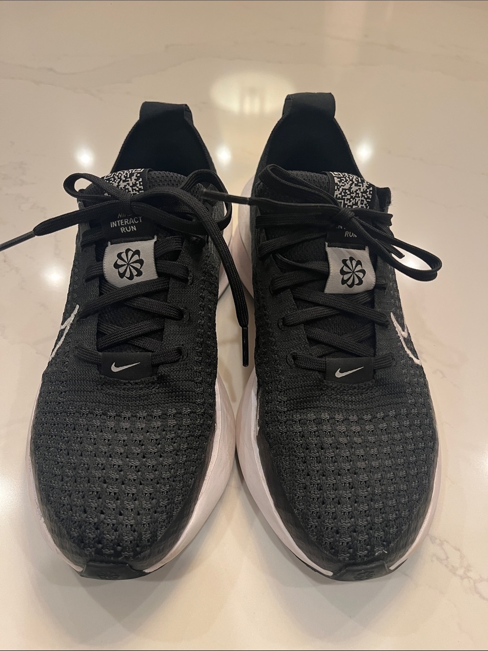 Nike Women’s Black and White Interactive Run Sneakers